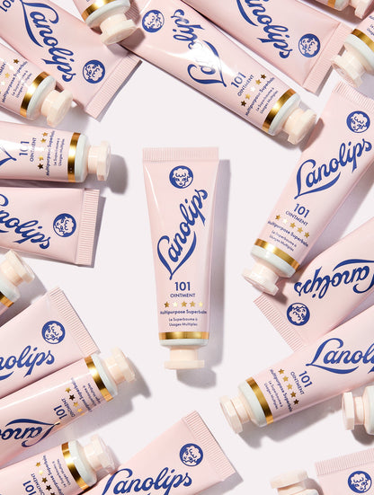 Product image of the 101 ointment multipurpose superbalm tube surrounded by many tubes of the same product.